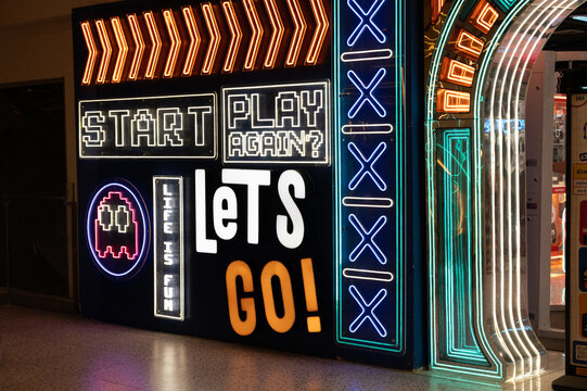 vintage neon sign, Arcade game closeup - Powered by Adobe