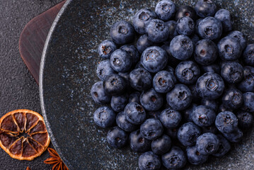 Fresh juicy blueberries, healthy vegan food with vitamins and minerals. Blueberries berry