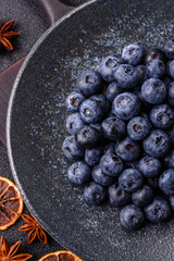Fresh juicy blueberries, healthy vegan food with vitamins and minerals. Blueberries berry
