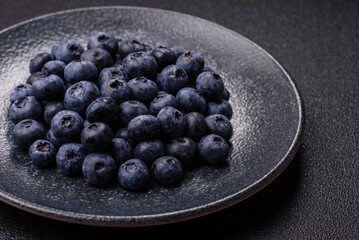 Fresh juicy blueberries, healthy vegan food with vitamins and minerals. Blueberries berry