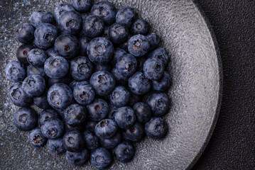 Fresh juicy blueberries, healthy vegan food with vitamins and minerals. Blueberries berry