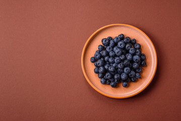 Fresh juicy blueberries, healthy vegan food with vitamins and minerals. Blueberries berry