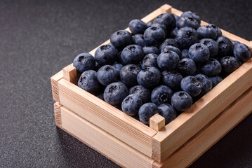 Fresh juicy blueberries, healthy vegan food with vitamins and minerals. Blueberries berry