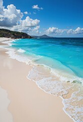 A picturesque beach with pristine white sand meets crystalclear turquoise waters as gentle waves lap against the shore under a bright blue sky dotted with fluffy clouds