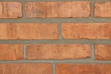 Texture of red brick wall as background, closeup