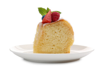 Piece of delicious bundt cake with berries, glaze and mint isolated on white