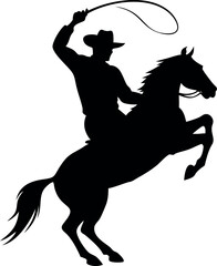 Silhouette of a cowboy on a rearing horse with a lasso