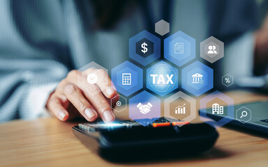 Calculation tax return and VAT concept, Business woman using calculator for calculates fill out...