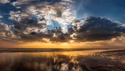 dramatic sky with light breaking through clouds on a serene father s day evening