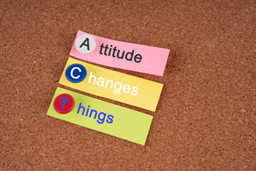 Attitude changes things text on paper note self improvement concept