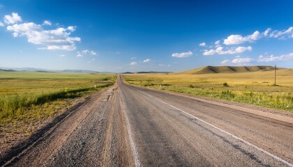Fototapeta premium scenic rural crossroads in kazakhstan under clear blue sky in summer season
