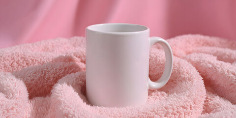 White Mug on Pink Fluffy Towel