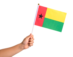 A hand proudly holding a waving flag of Guinea-Bissau, representing national identity and independence.