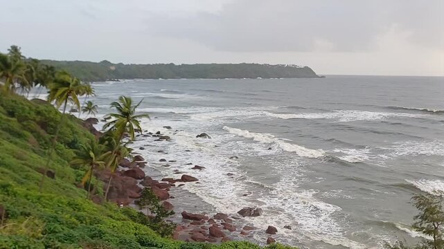 Goa beach in monsoon time. cabe de rama beach. waves on the beach