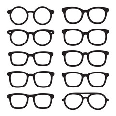Ten black eyeglass and spectacle silhouettes on white