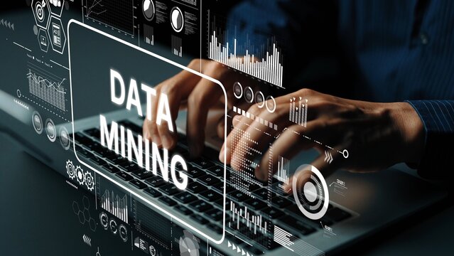 Hands Typing on Laptop with Data Mining Graphics and Digital Interface Elements in a Modern Workspace. Asymptotic smart data analytic.
