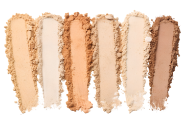 Swatches of cosmetic face powder in various shades, isolated on a white background.
