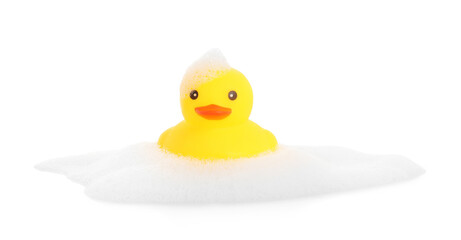 One cute rubber duck and foam isolated on white