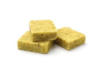 Three aromatic bouillon cubes isolated on white