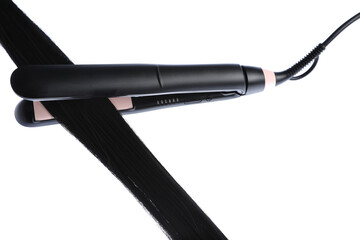 Straightener with black hair lock isolated on white