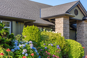 Entrance of luxury house in summer with nice landscape in Vancouver, Canada, North America. Day time on July 2025.
