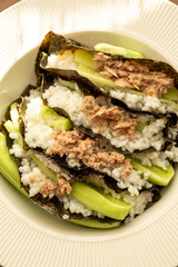 Homemade sushi taco recipe with tuna in close-up