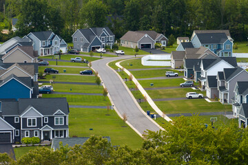 Housing market in the USA. Residential homes in suburban sprawl development in Rochester, New York. Low-density two story private houses in rural suburbs