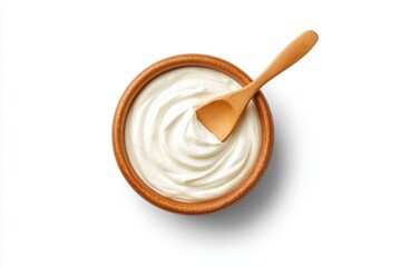 Bowl of yogurt with wooden spoon