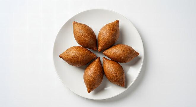 Delicious kibes, very typical at parties and bars in Brazil, served on a plate