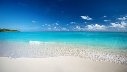 Obraz premium escape to tranquility sandy beach meets turquoise water under clear blue sky at tropical horizon your ideal vacation destination