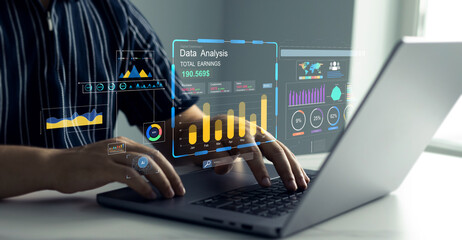 Professional working on virtual dashboard with interactive business data, global charts, financial KPIs, and performance analytics on futuristic digital interface.	
