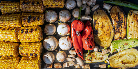 Top view of fresh vegetables prepared for bbq on the grill pan. Bright and colorful. Vegetarian party concept