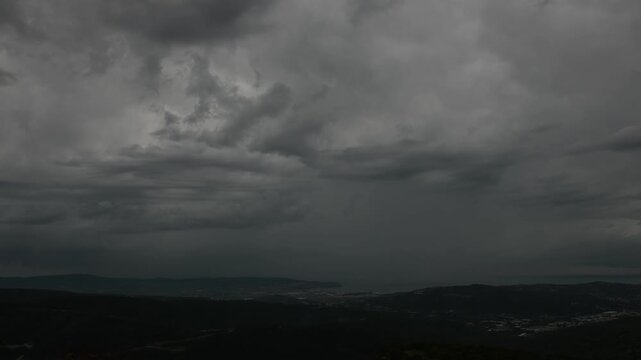 Time lapse of an approaching thunderstorm with lightning flash over the Gulf of Trieste, Italy