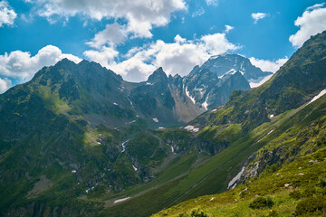 Fototapeta premium a beautiful view of the summer mountains, valleys, and waterfalls