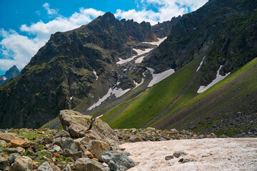 a beautiful view of the summer mountains, valleys, and waterfalls