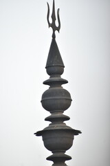 Nagara-style temple Shikharas rise skyward with curving elegance, symbolizing spiritual ascent. Intricately carved, these towering spires crown sanctums with divine grace and timeless artistry.