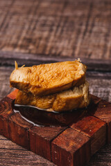 Chicken pintxo seasoned with a soy reduction.