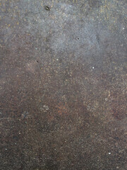 Texture of old rusty metal sheet with moss, close-up, metal corrosion