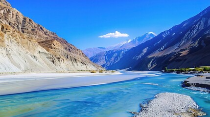 Scenic view of the Indus River, a historic waterway flowing through Pakistan and India, featuring calm waters, fertile riverbanks, traditional boats, rural villages, and lush vegetation