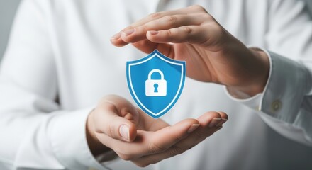 Man in a white shirt holding a blue shield with a lock symbol, representing security and protection