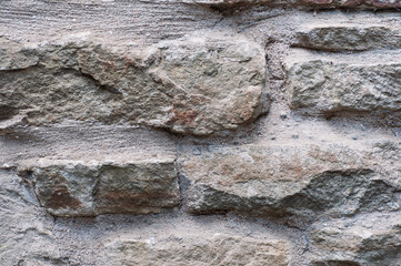 Stone wall texture. Rough surface. Background stone built wall