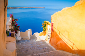 Fototapeta premium street and wooden gates against volcano caldera, beautiful details of Santorini island, Greece