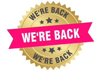 Obraz premium we're back. we're back round pink and gold label isolated on transparent background