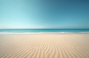 Obraz premium Deserted sand beach under clear blue sky shows serene ocean horizon. Natural landscape captures summer vacation travel mood. Peaceful shoreline features calm sea under sunny daylight, minimalist