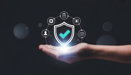 Hand of Security: A hand cradles a digital shield icon, representing digital protection and data safety in a dark, minimalist environment. It's a visual metaphor for the importance of security.