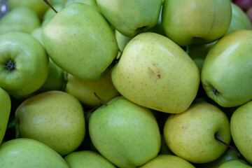 Many ripe red, green apples. Sale of apples at the market and store. Background. Top view. Concept sale at the market and store. Farm products.