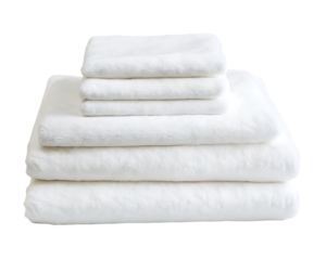 Soft fluffy white towels stacked isolated on a transparent background