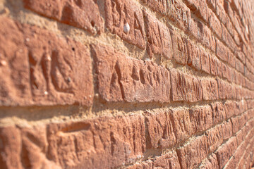 Brick wall with names etched