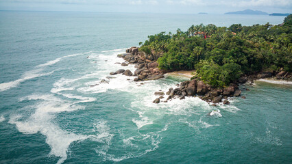 Secluded tropical beach and rocky coastline in Ubatuba, Brazil