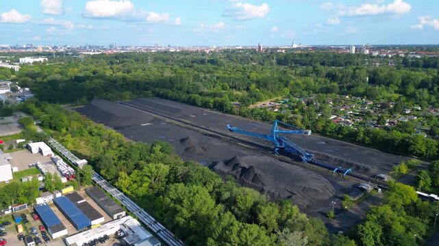 Spreader coal Excavator at a coal storage. Nice aerial view flight drone